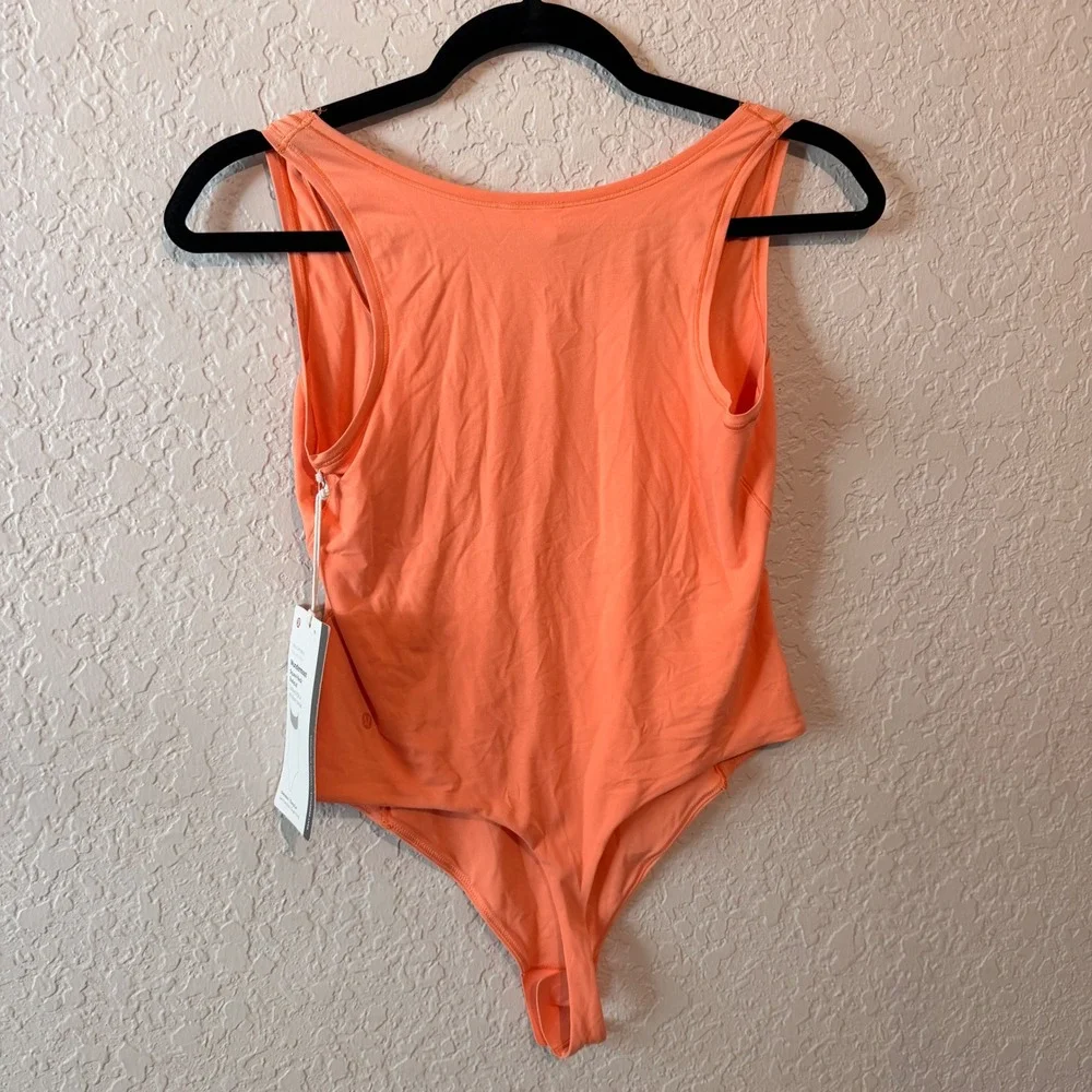 Lululemon Wundermost Square-Neck Bodysuit M Orange Peach NWT